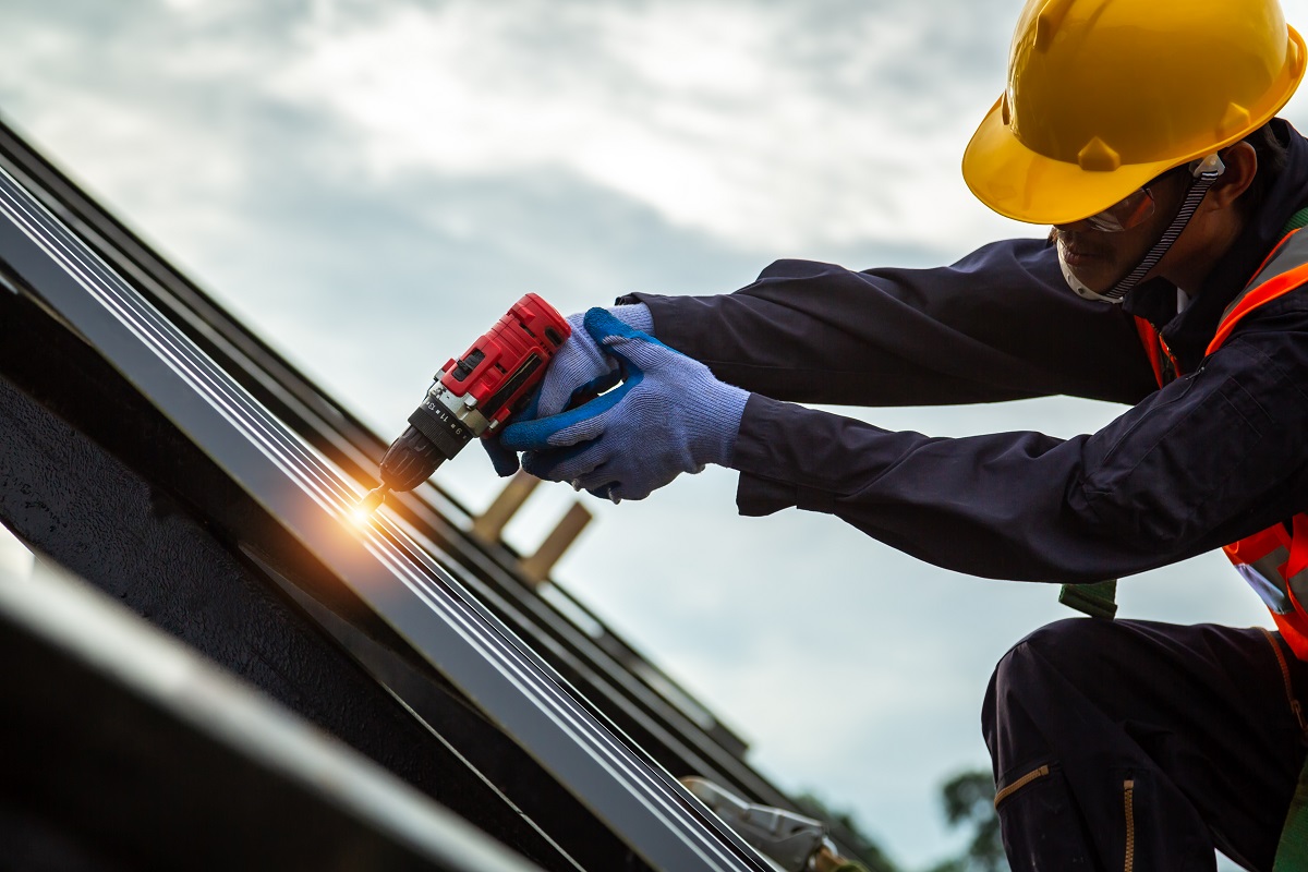 [Construction roof] Roofer worker in protective uniform wear and