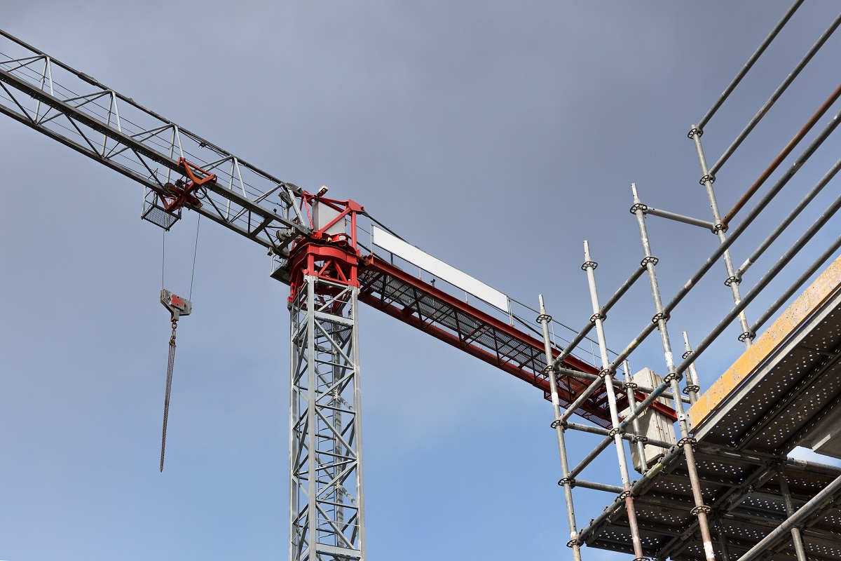 Crane and scaffold on building construction