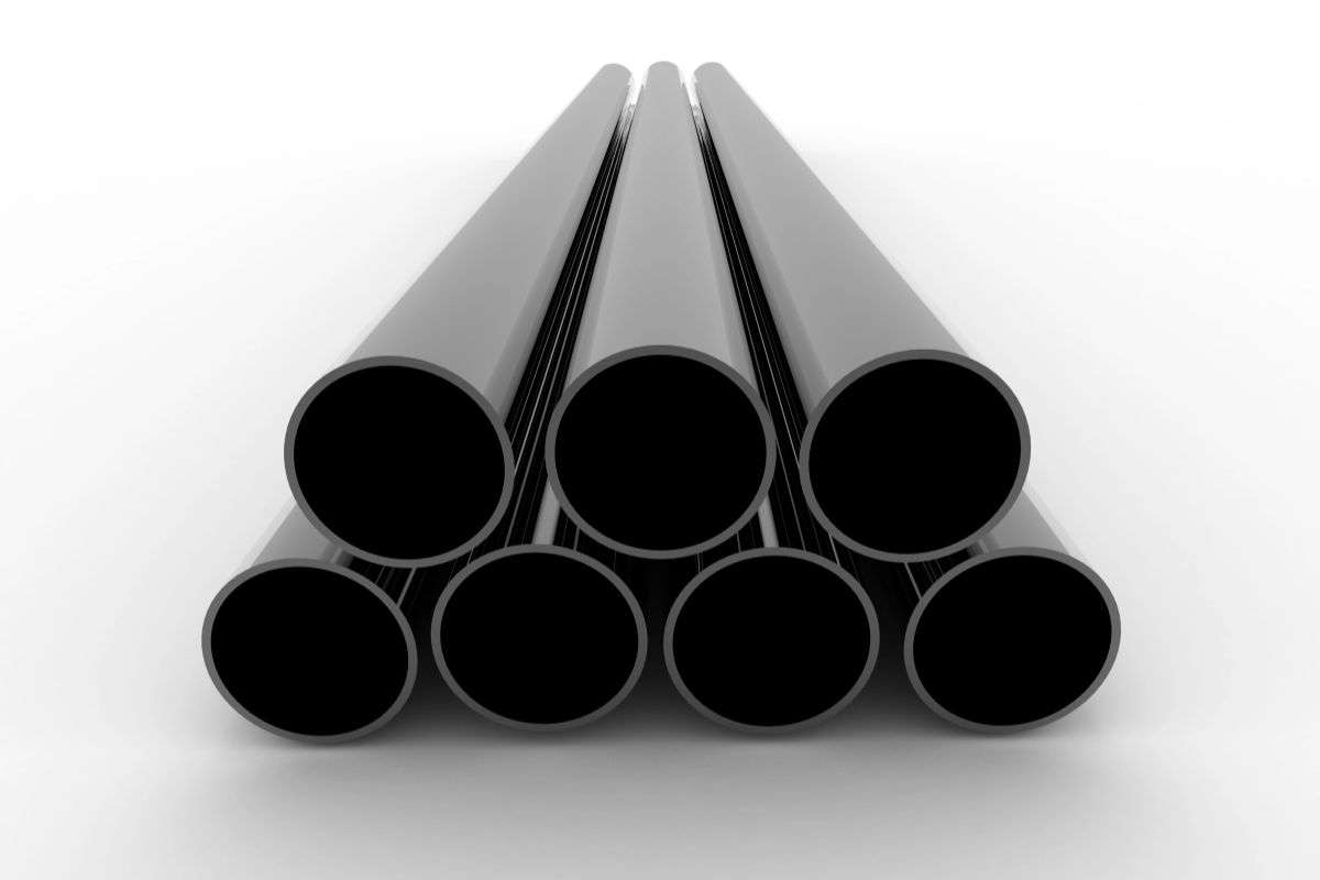 Rendered galvanized pipes stacked in a triangular arrangement, showing smooth round openings and uniform pipe shape