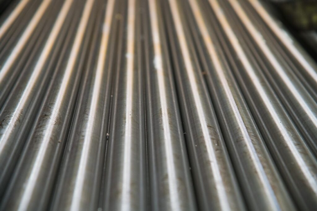 Close-up of straight steel pipes highlighting uniform dimensions and surface consistency for structural performance
